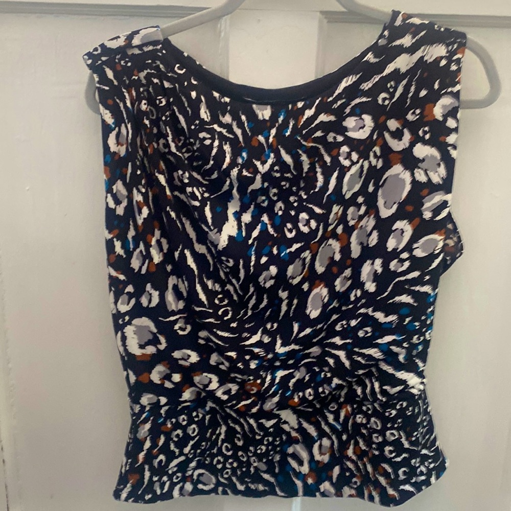 White House Black Market, multicolored. A large Medium. Very flattering.
